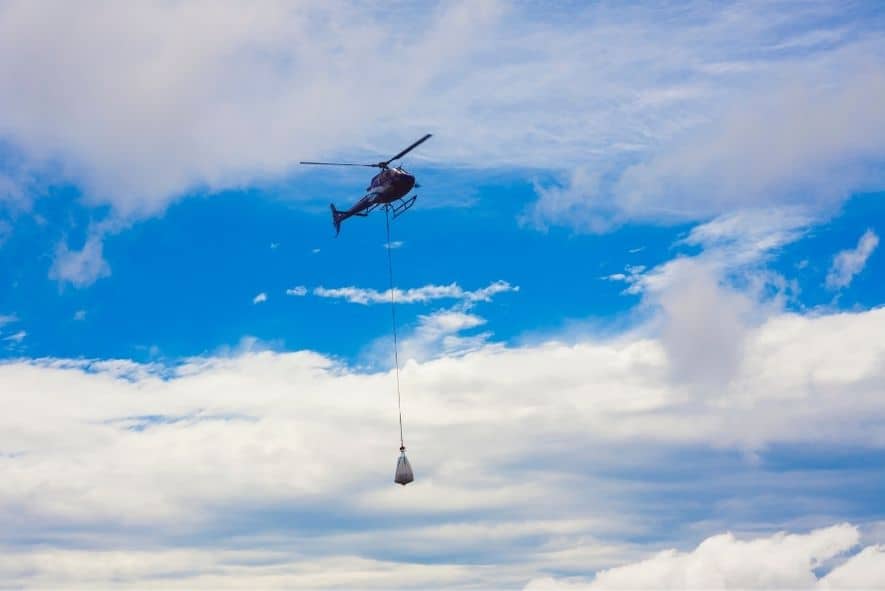 how much weight can a huey helicopter lift